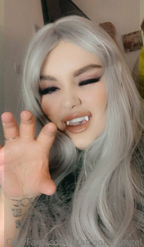 btattooed angel model adult pic