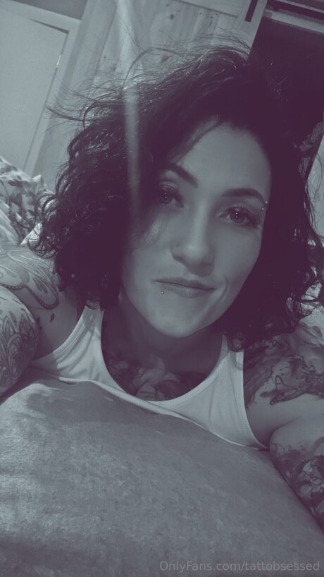 Tattobsessed adult model pics