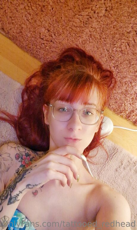 Tattooed Redhead sexy actress photos