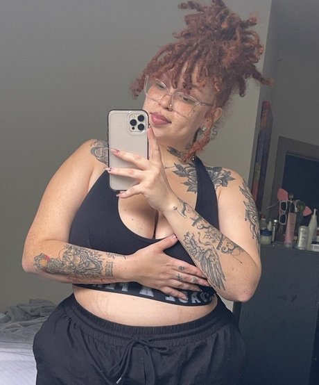 AHintOfRed pornstar naked archive