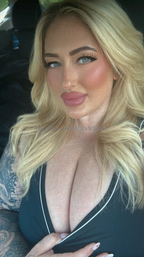 Miss Thick N Tatted erotic star pics