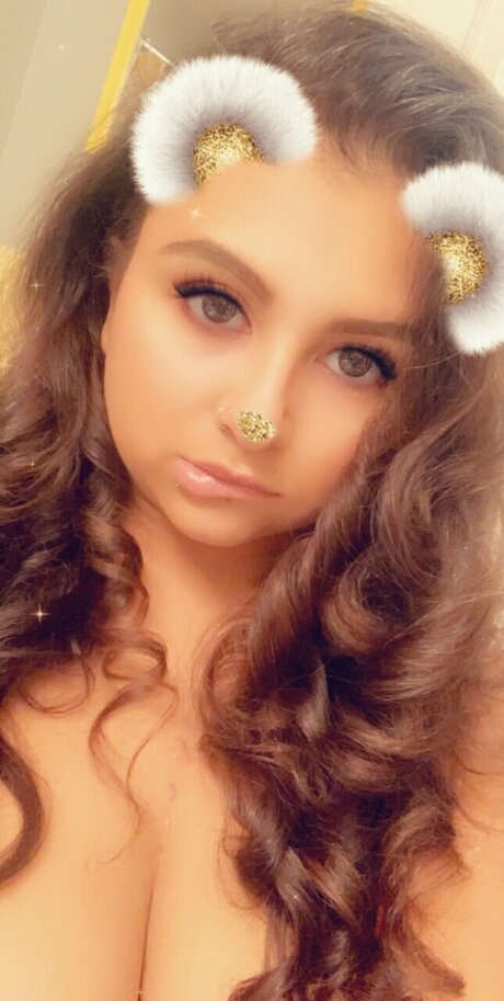 Foxy Redbone nude pornstar photos