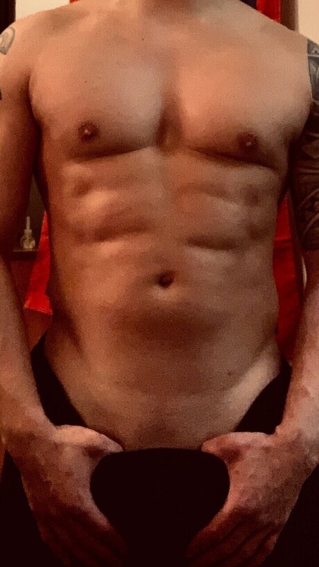 Mr Lite Brown pornographic model photo