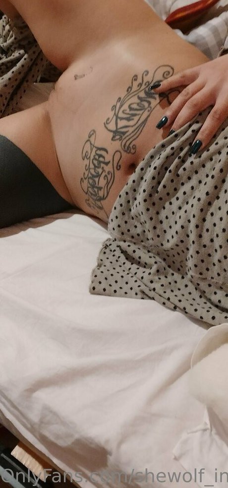 shewolf inked nude model photos