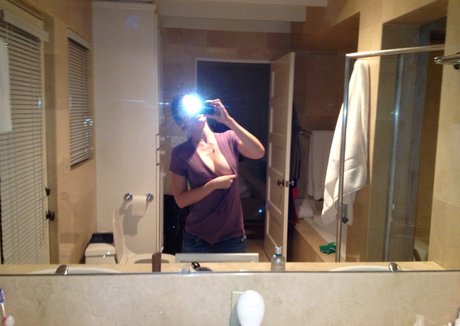 Lizzy Caplan Profile