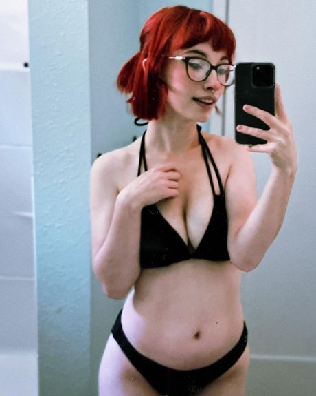 rousse tatouée onlyfans sexe artistique photo