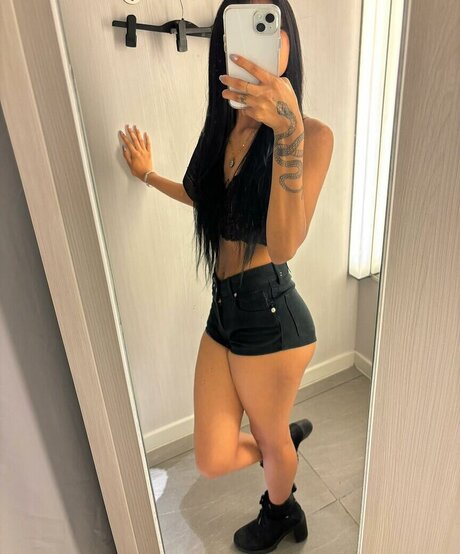 rousse aux gros seins onlyfans haut érotique galerie